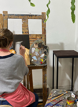 Art Student doing a painting at Art Classroom at Fitzroy Painting in Melbourne